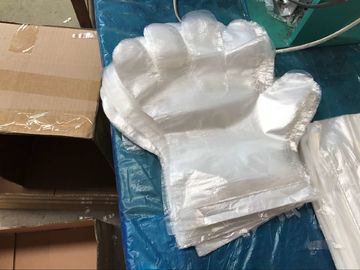 Die einmal-Wegwerfplastikhandschuhe/die Polythen-Handhandschuhe machen prägeartige Art glatt